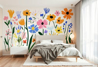 Vibrant floral mural in red, blue, and yellow

