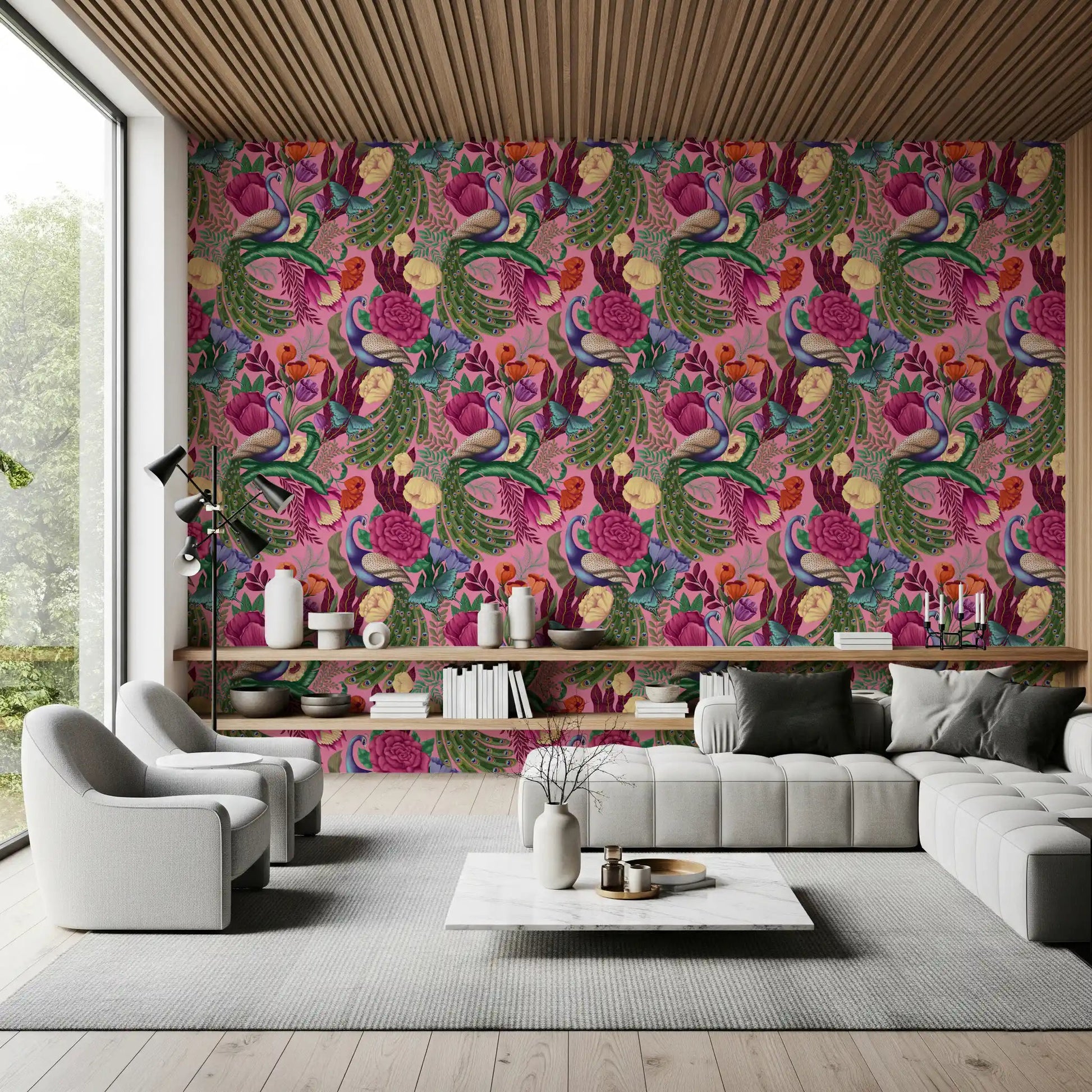Pink peacock wallpaper in a living room with floral and feather detail