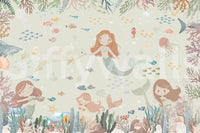 Neutral coastal mural in nursery, gentle ocean look with light blue and beige tones