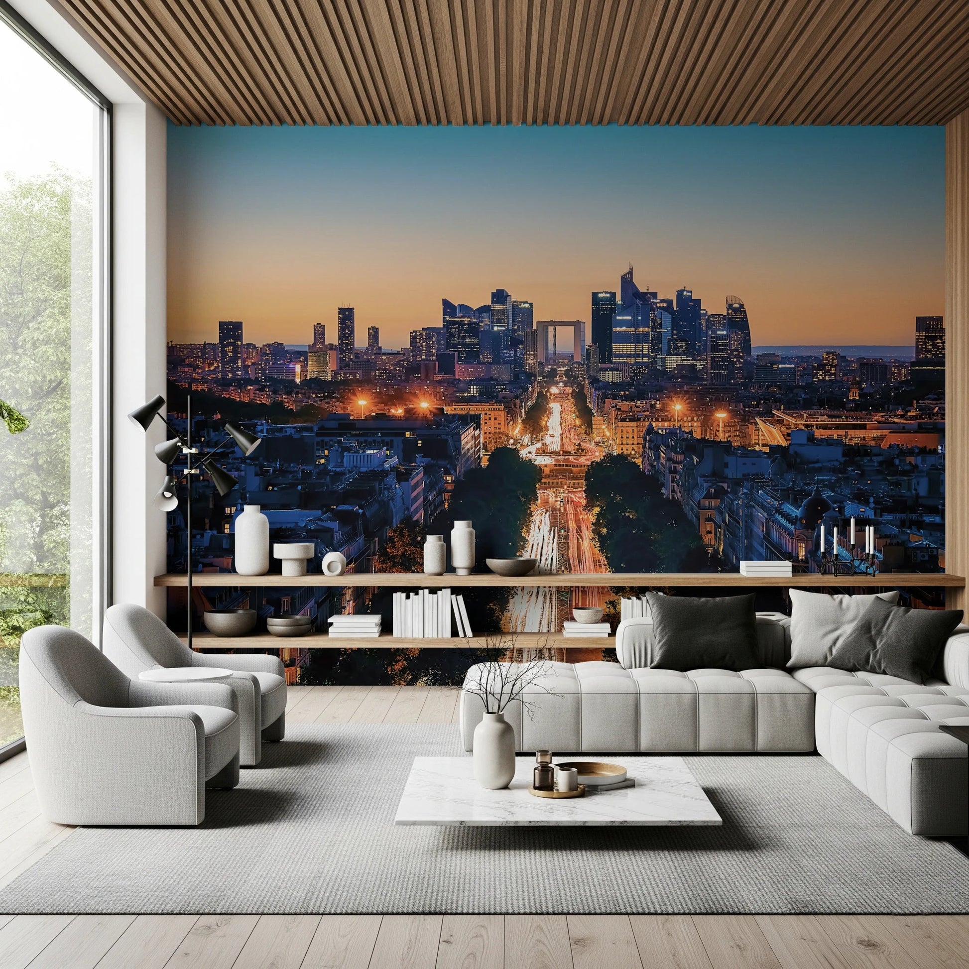 Metropolis Dusk wallpaper mural of a dusk city skyline behind a grey sofa under a wood-slat ceiling in a living room