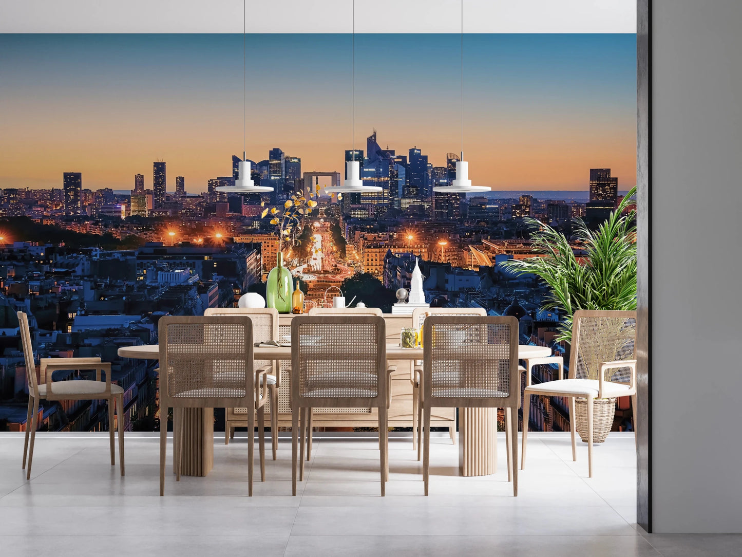 Metropolis Dusk wallpaper mural showing a twilight skyline behind a wood cane dining table and chairs