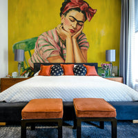 Colorful mural of muse surrounded by traditional art

