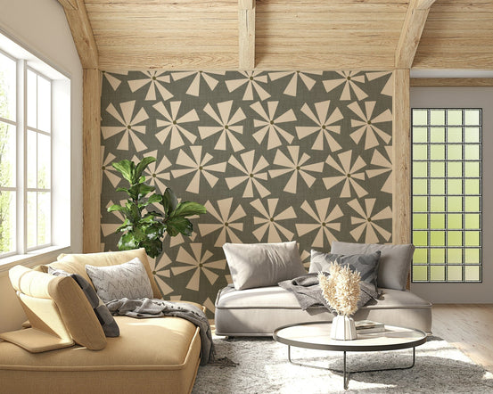 Retro floral wallpaper with abstract pinwheel-style blooms arranged in a scattered pattern.
