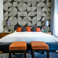Concrete wall mural featuring mid-century mosaic design

