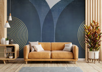 Mid Century Modern Blue wallpaper mural behind a tan leather sofa and wooden sideboard in a living room