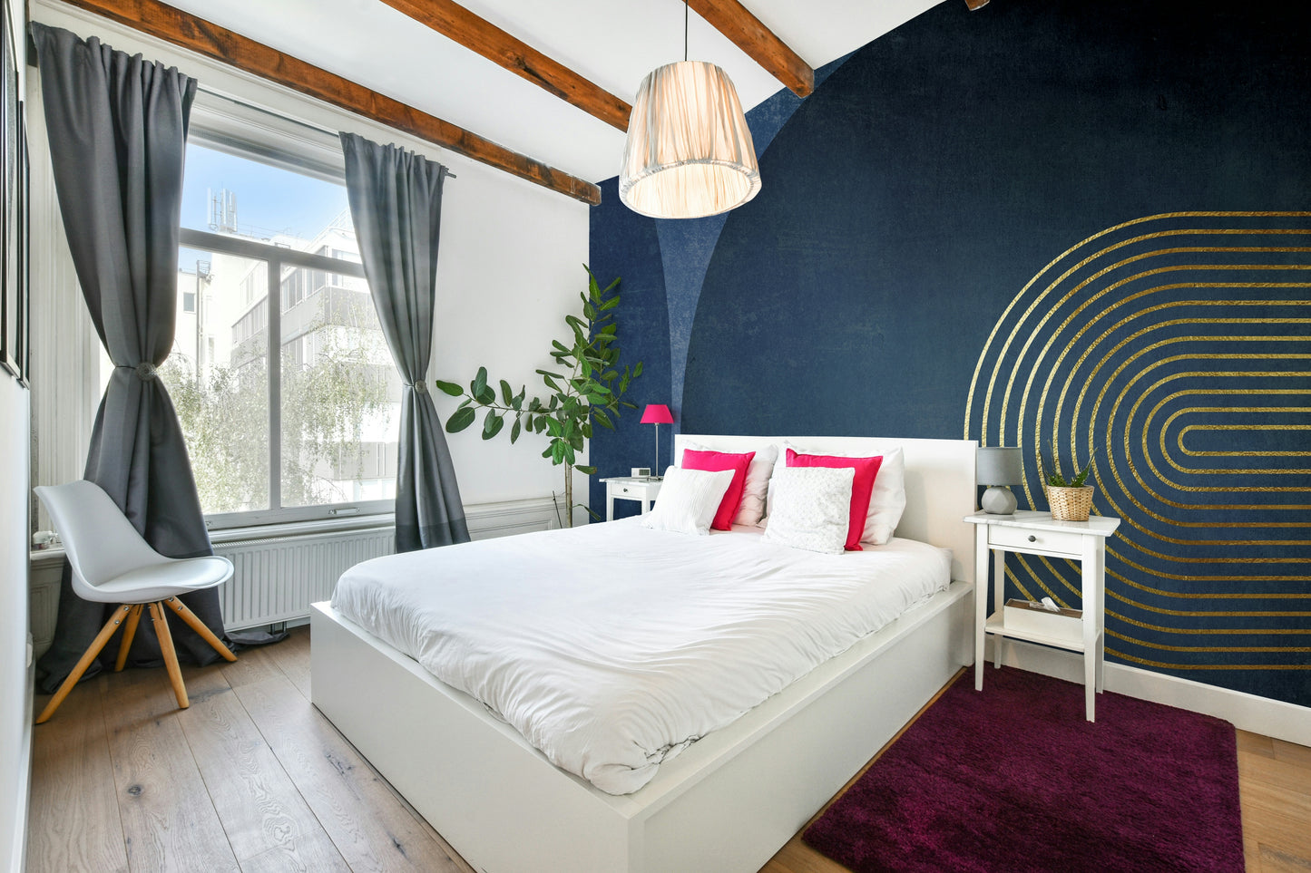 Mid Century Modern Blue wallpaper mural above a white bed with pink pillows and a magenta rug in a bedroom