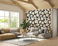 Midnight-themed floral wallpaper with bright daisies

