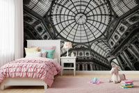Vaulted architecture wall mural on TV wall, warm neutrals, modern living space styling.