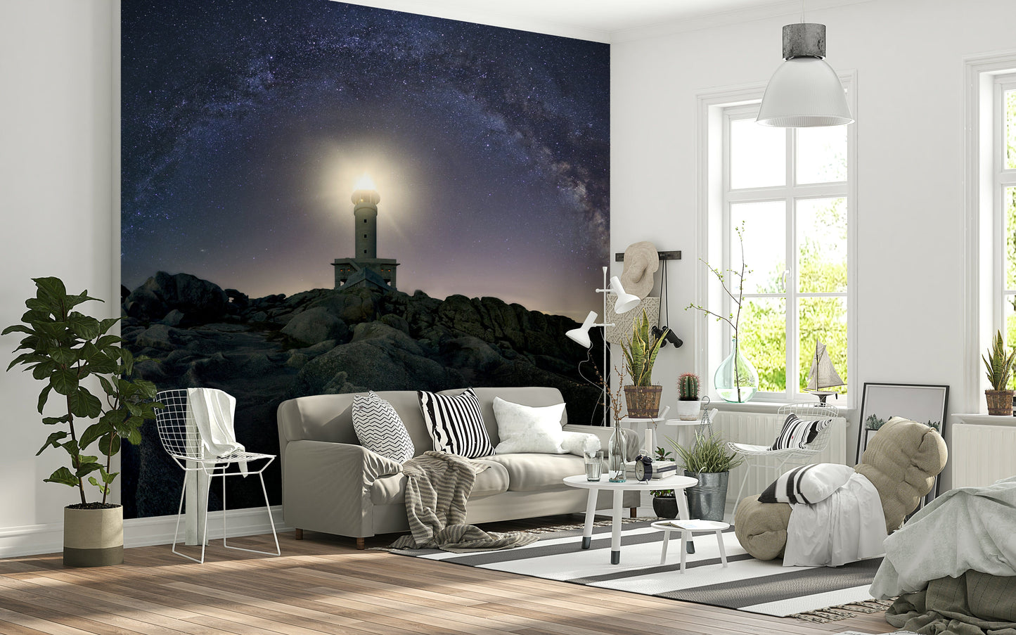 Wall mural with a luminous beacon casting light over a serene, star-filled horizon.