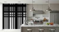 Minimal Black & White Stripes wall mural on a kitchen wall beside grey cabinets and a marble island