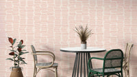 Pink wallpaper with organic brush stroke stripes

