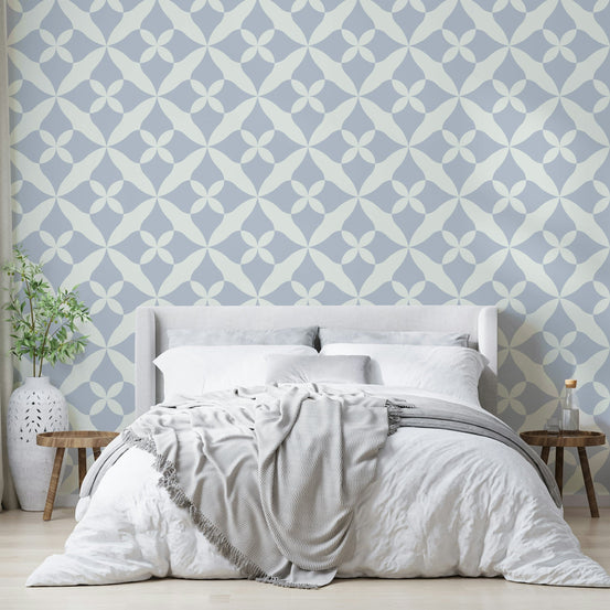 Geometric blue and cream pattern wallpaper.