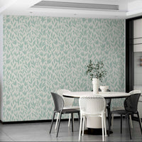 The design is a repeating pattern of small, scattered mint sprigs.
