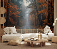 Living room with autumn lane wall mural and foggy tree depth