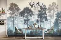 Misty Blue Forest wall mural behind a grey dining table with green chairs and a bubble pendant light