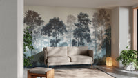 Misty Blue Forest wall mural behind a beige sofa with potted plants and a lantern in a living room
