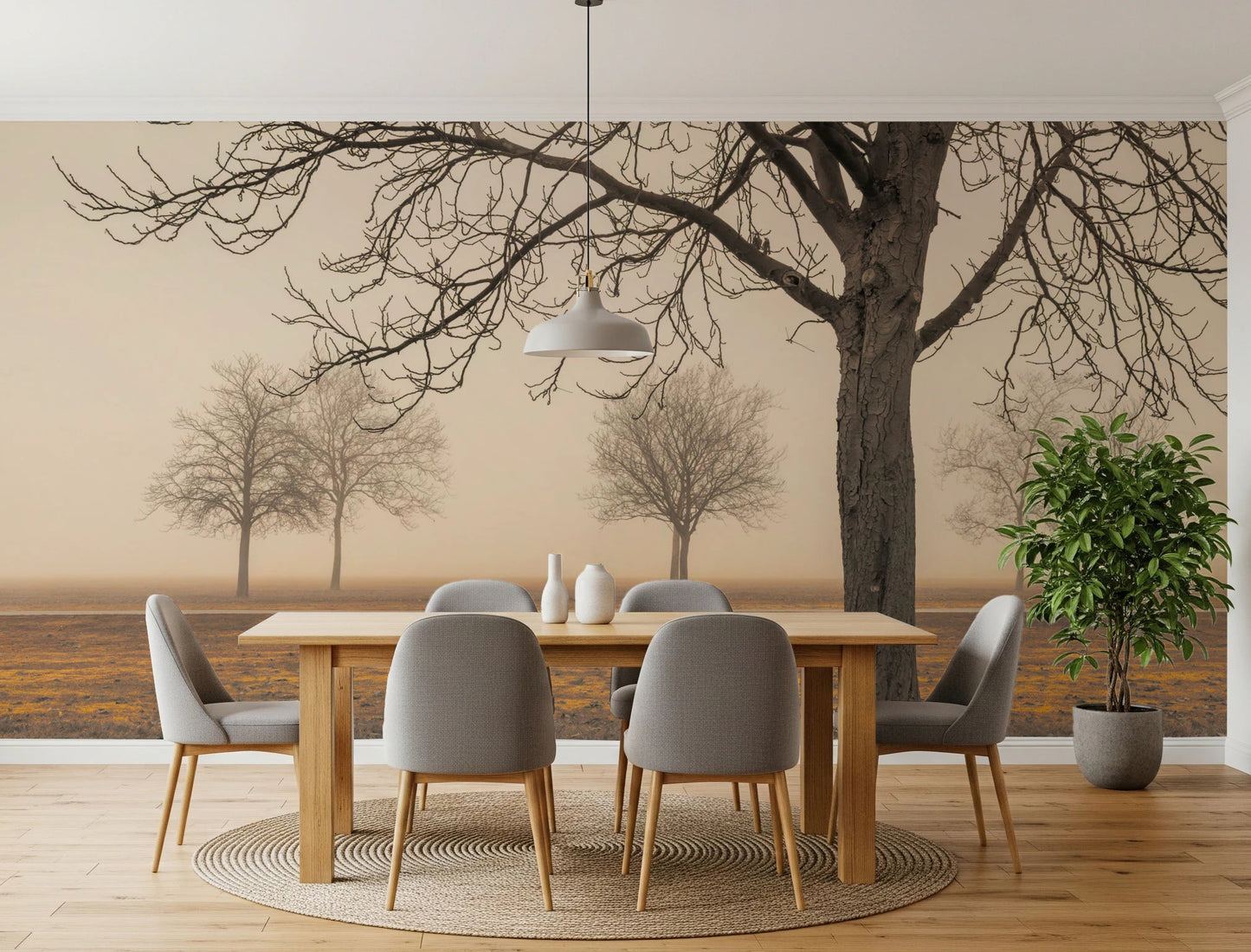 Misty Countryside wallpaper mural with sepia trees in fog behind an oak dining table and grey chairs in a dining room