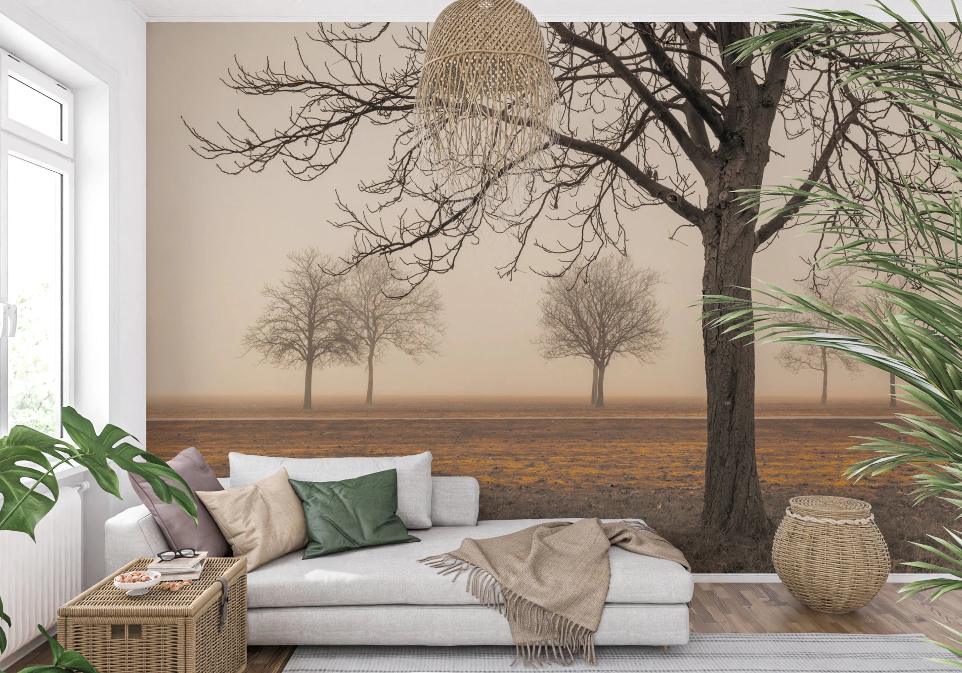 Misty Countryside wallpaper mural with foggy autumn trees behind a white daybed and rattan baskets in a living room