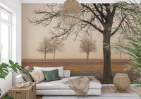 Misty Countryside wallpaper mural with foggy autumn trees behind a white daybed and rattan baskets in a living room