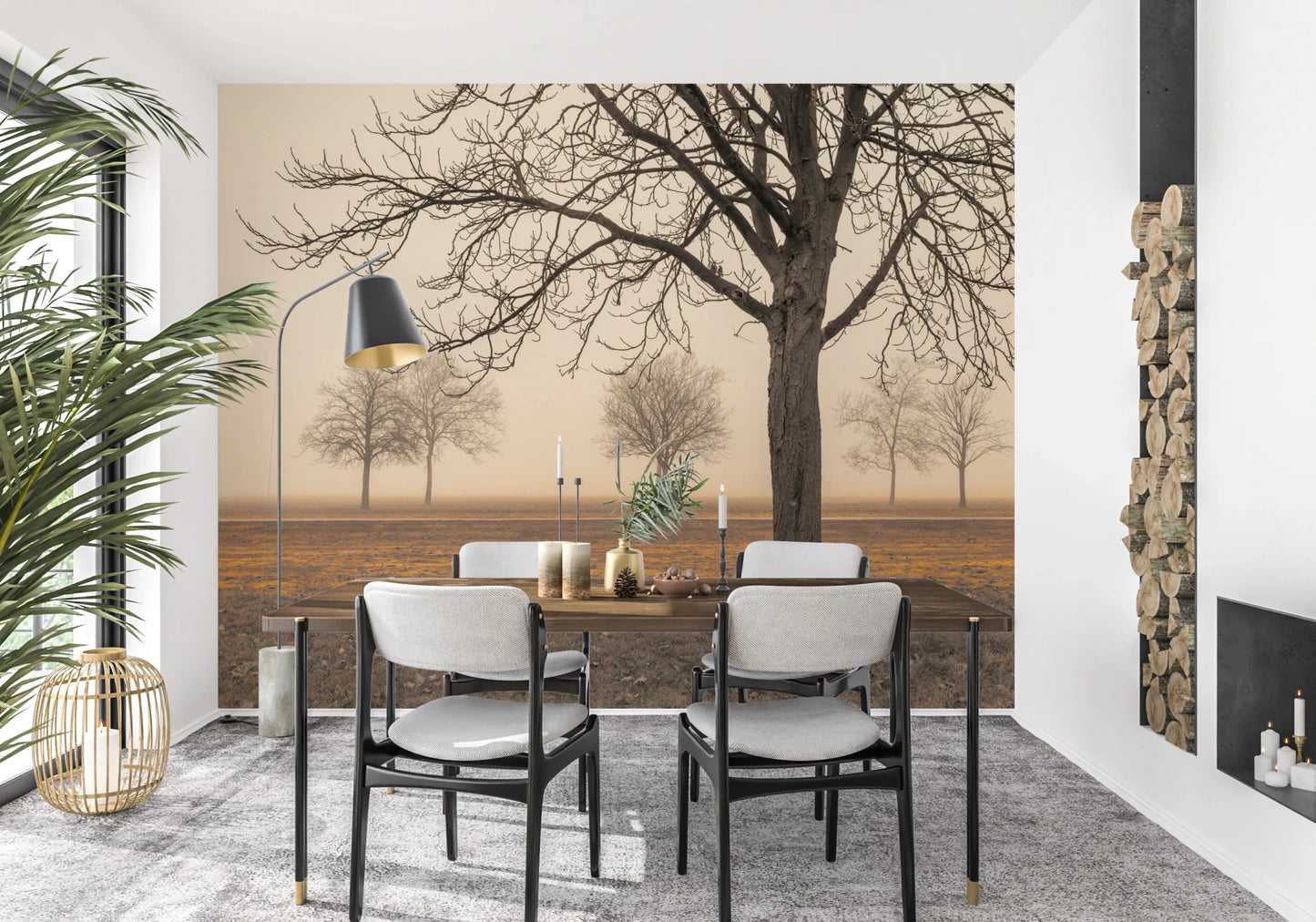 Misty Countryside wallpaper mural of foggy bare trees behind a wood dining table and chairs by a firewood stack