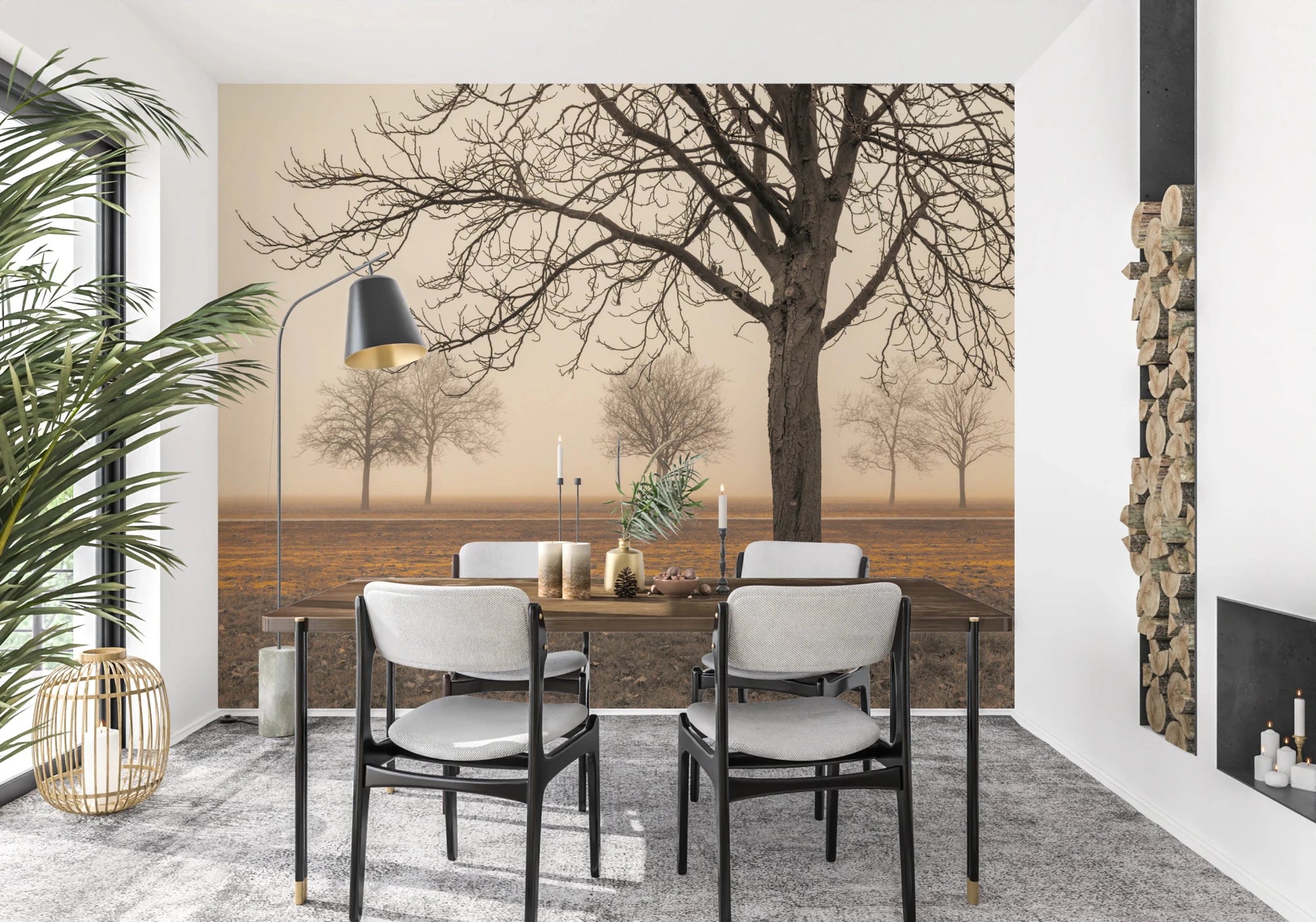 Misty Countryside wallpaper mural of foggy bare trees behind a wood dining table and chairs by a firewood stack
