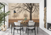 Misty Countryside wallpaper mural of foggy bare trees behind a wood dining table and chairs by a firewood stack