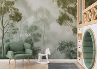 Misty green forest wallpaper with lush trees and soft fog
