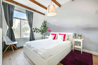 A close-up of the delicate trees and mist.

