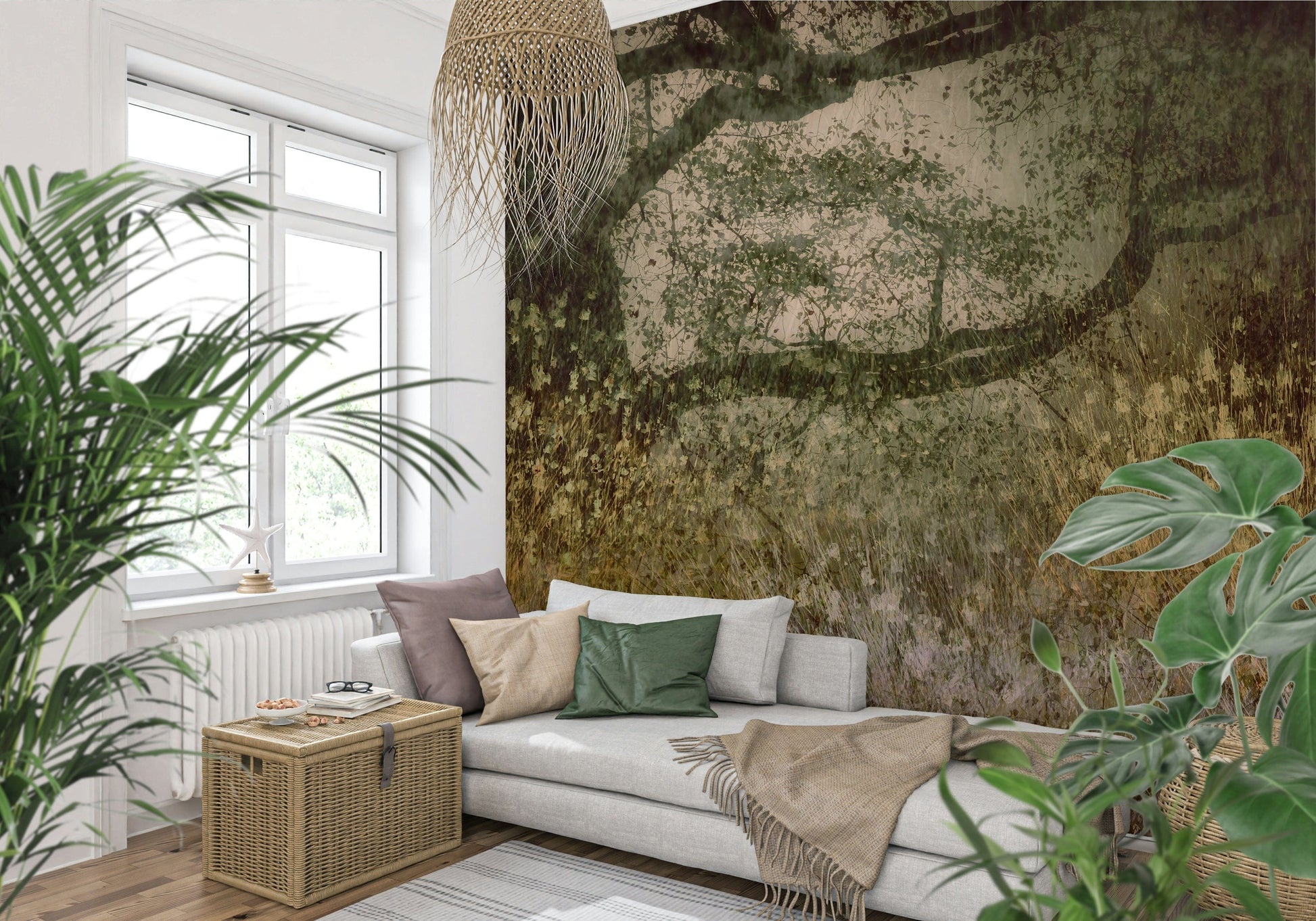 Filtered Light wallpaper mural of a green meadow tree behind a white daybed and rattan trunk with palms