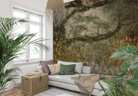 Filtered Light wallpaper mural of a green meadow tree behind a white daybed and rattan trunk with palms