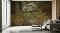 Filtered Light wallpaper mural of a golden meadow and tree behind a grey sofa and black coffee table
