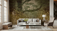 Filtered Light wallpaper mural of a green meadow and tree behind a cream sofa and brass globe floor lamp