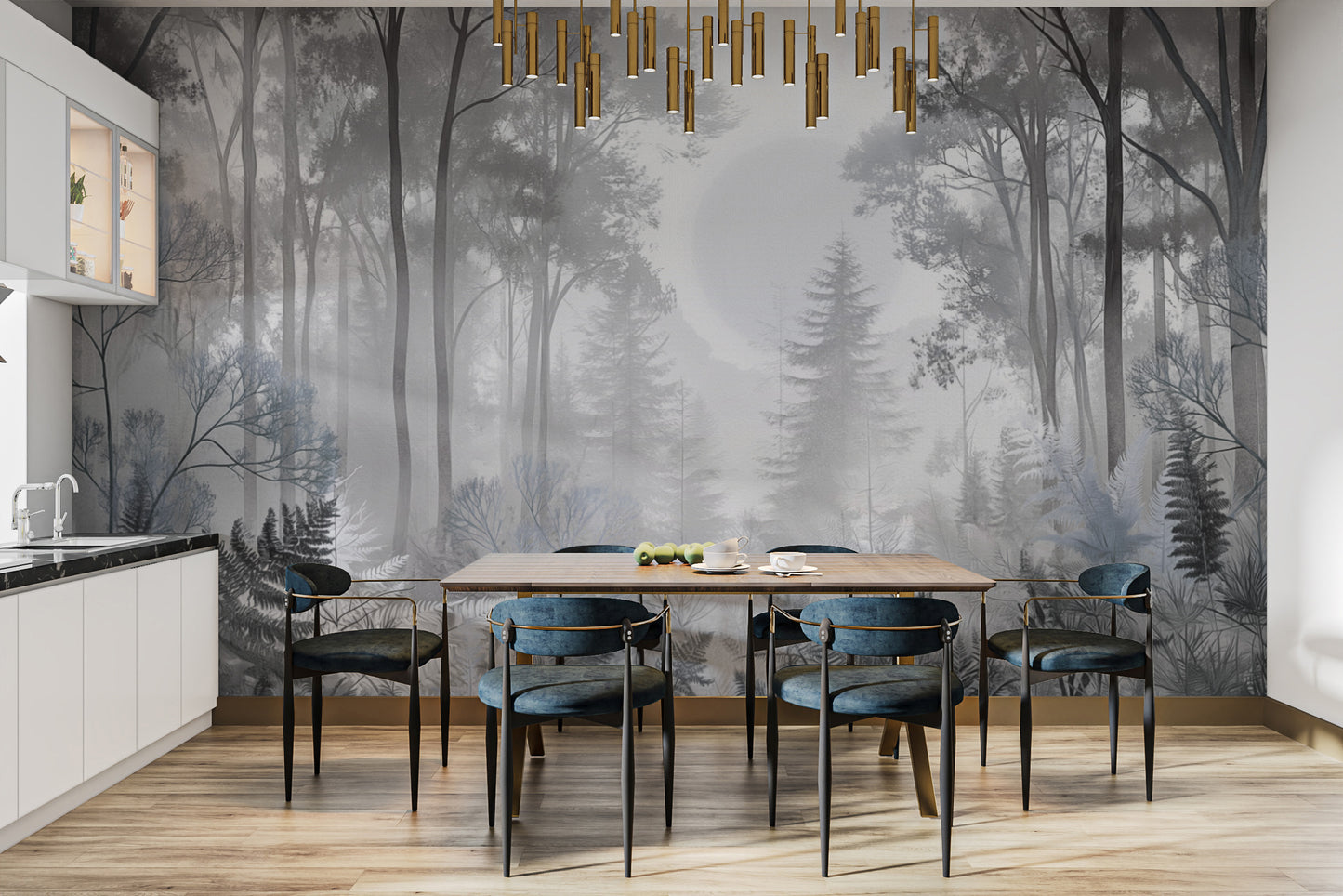 Misty Monochrome Forest wall mural in grey behind a wooden dining table and blue velvet chairs in a kitchen diner