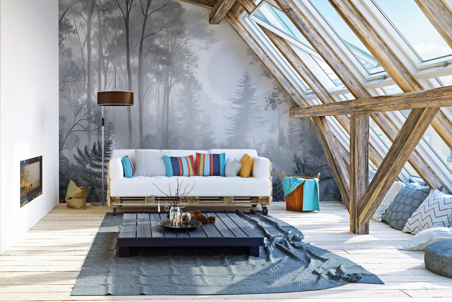 Misty Monochrome Forest wall mural in grey behind a white pallet sofa with striped pillows in an attic loft living room