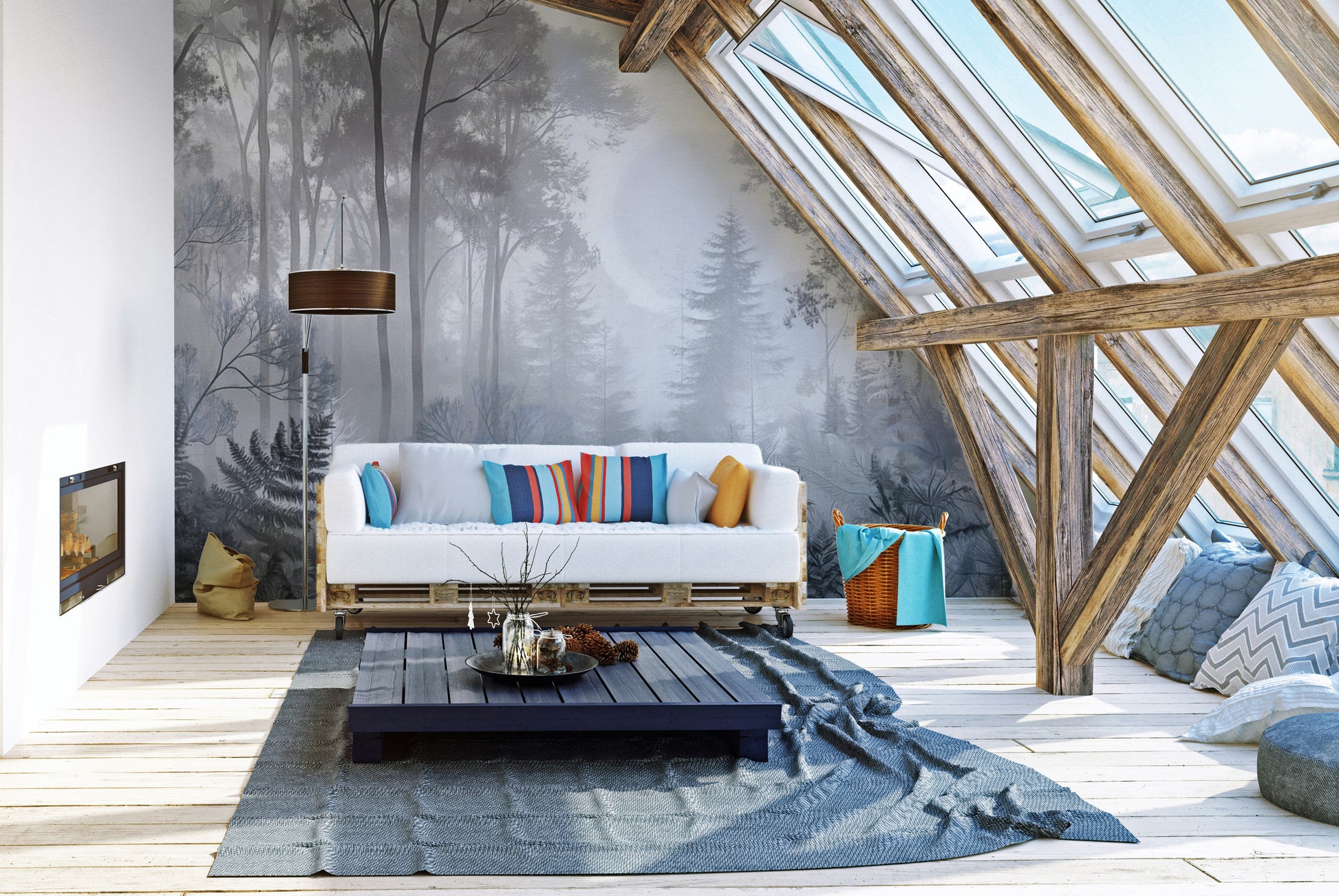 Misty Monochrome Forest wall mural in grey behind a white pallet sofa with striped pillows in an attic loft living room