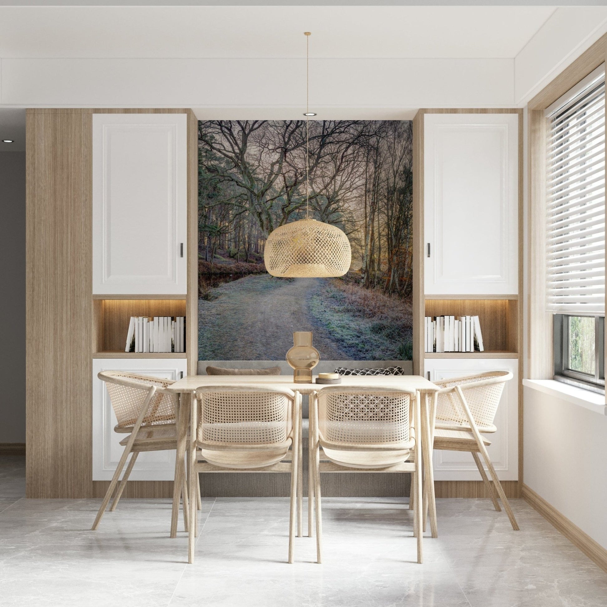 Misty Woodland Glare mural in a dining nook with a wood table, cane chairs and a rattan pendant lamp