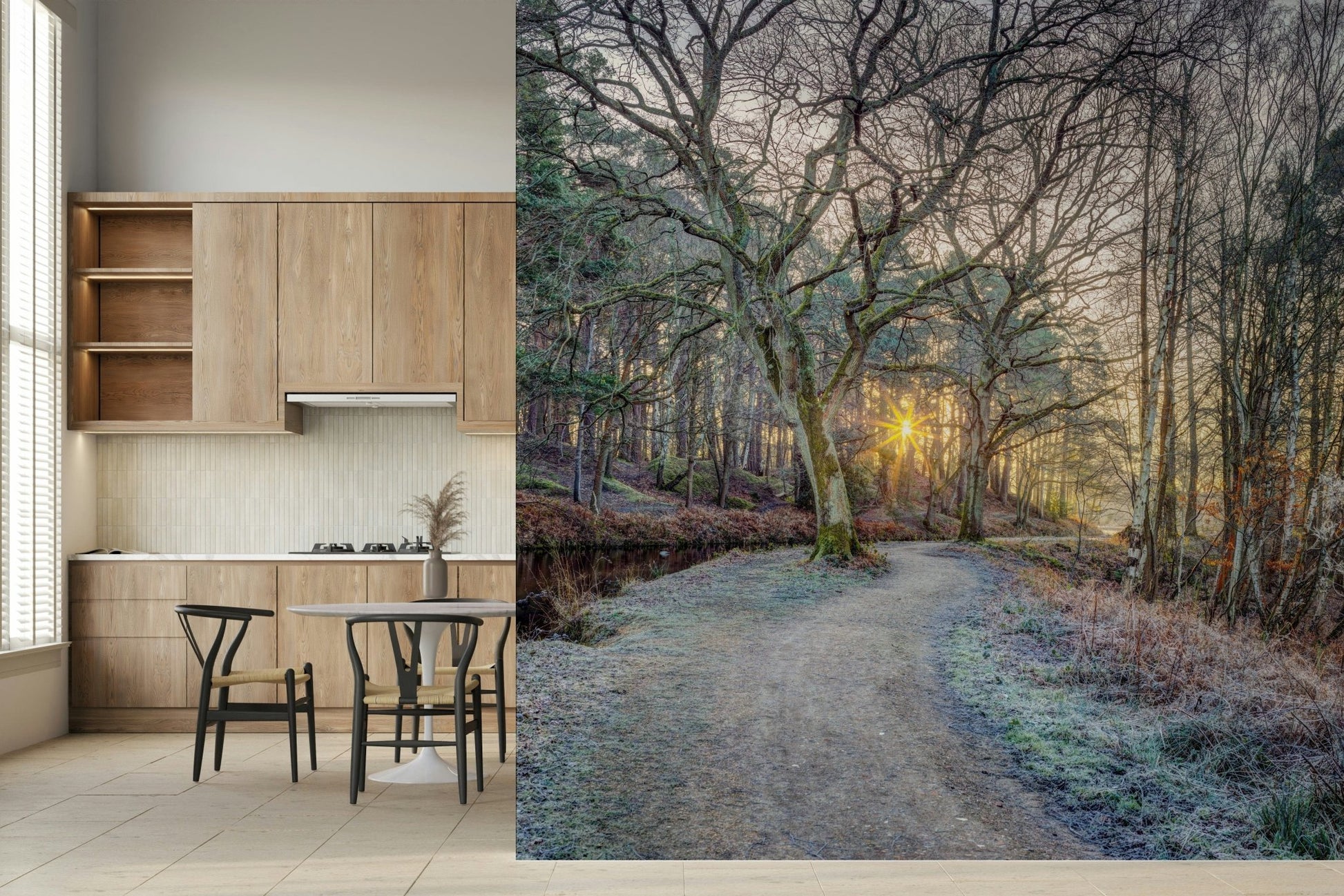 Misty Woodland Glare mural beside a wood kitchen with a round table and black wishbone chairs