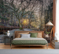 Misty Woodland Glare mural over a wood bed with green bedding, a pleated floor lamp and black side table