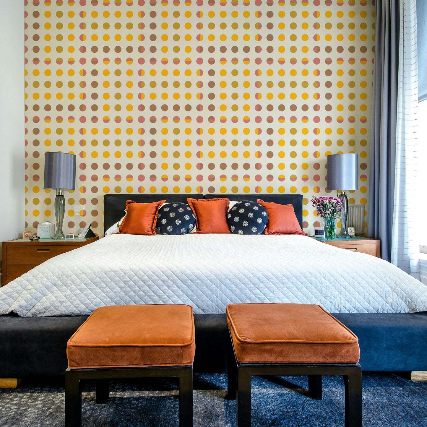 Large scale geometric circles on high-quality wallpaper for a dining area.