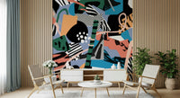 An artistic abstract shape mural on elegant wallpaper.

