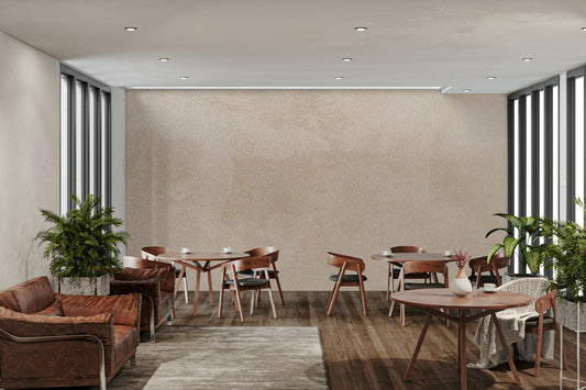 Modern Minimalist Beige wallpaper mural on a lounge feature wall behind a brown leather sofa and wooden dining tables
