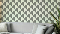 A modern wall mural with a repeating geometric arc pattern.

