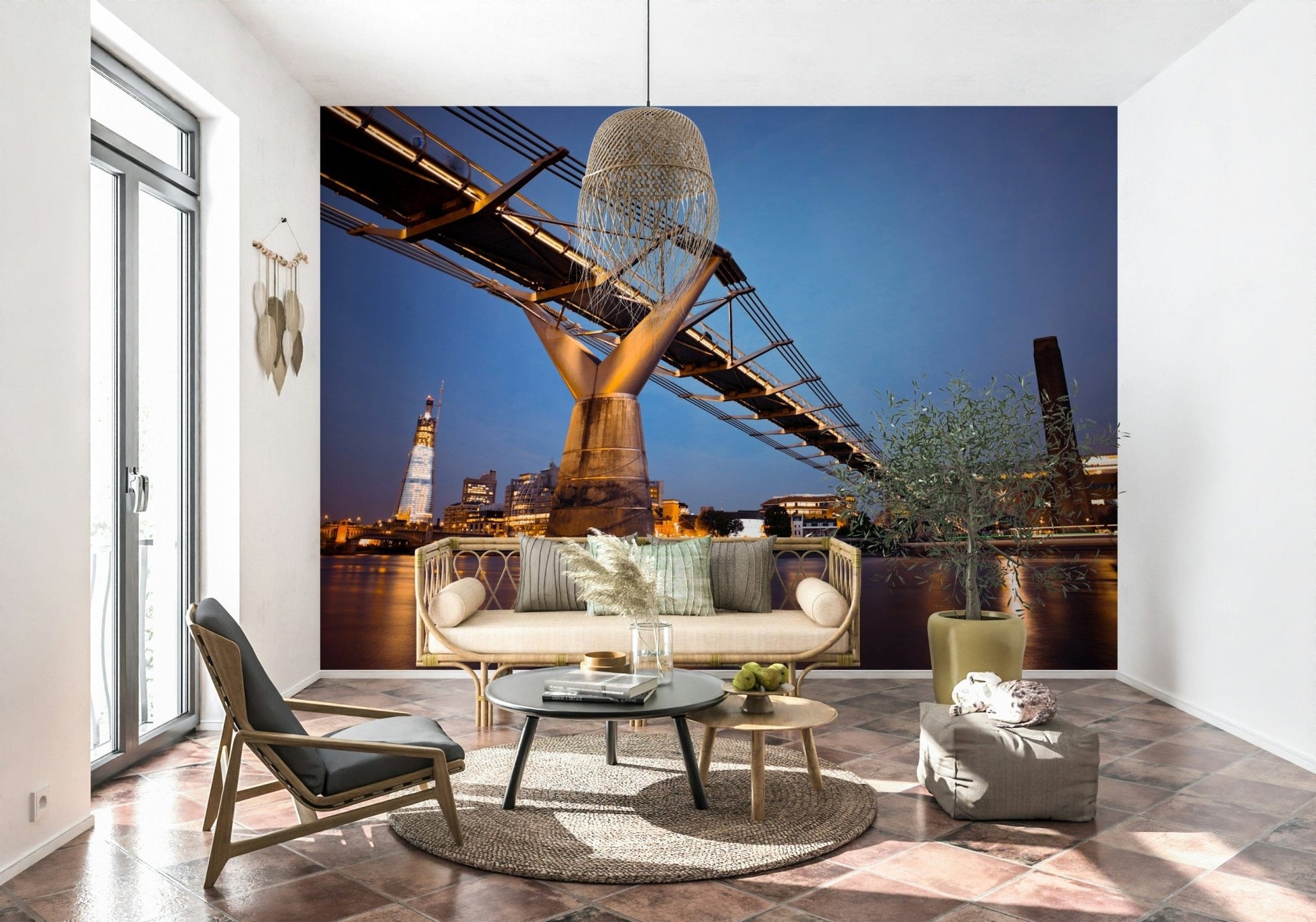 Modern Meets Classic wallpaper mural of the Millennium Bridge behind a rattan daybed and olive tree on terracotta tile