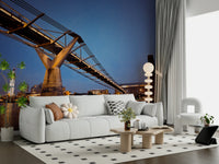Modern Meets Classic wallpaper mural of the Thames bridge above a white sofa with a daisy cushion in a living room