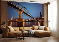 Modern Meets Classic wallpaper mural of the Millennium Bridge over the Thames behind a tan sectional sofa in a living room