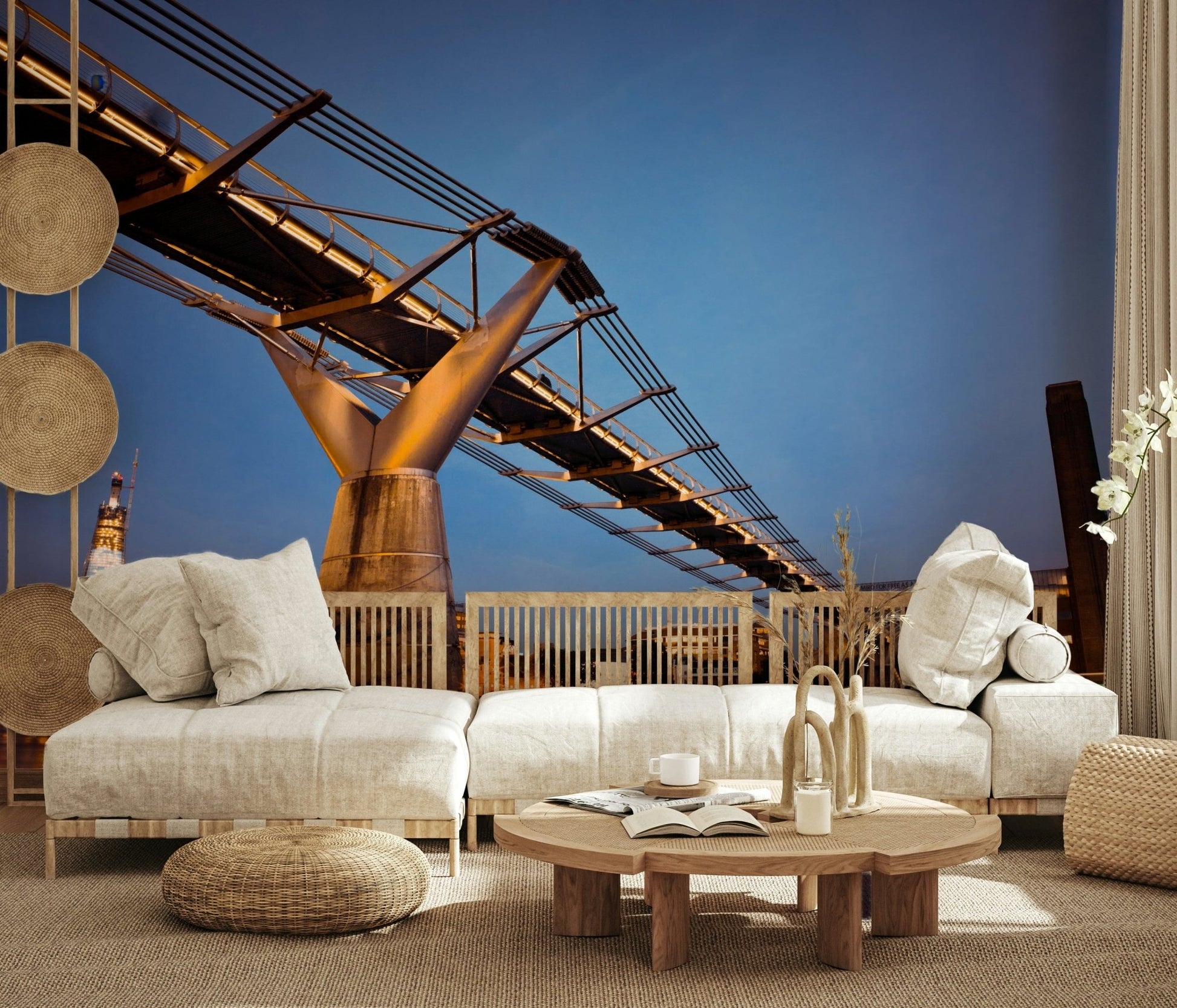 Modern Meets Classic wallpaper mural of the Thames bridge at twilight behind a low cream modular sofa in a boho lounge