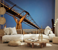 Modern Meets Classic wallpaper mural of the Thames bridge at twilight behind a low cream modular sofa in a boho lounge