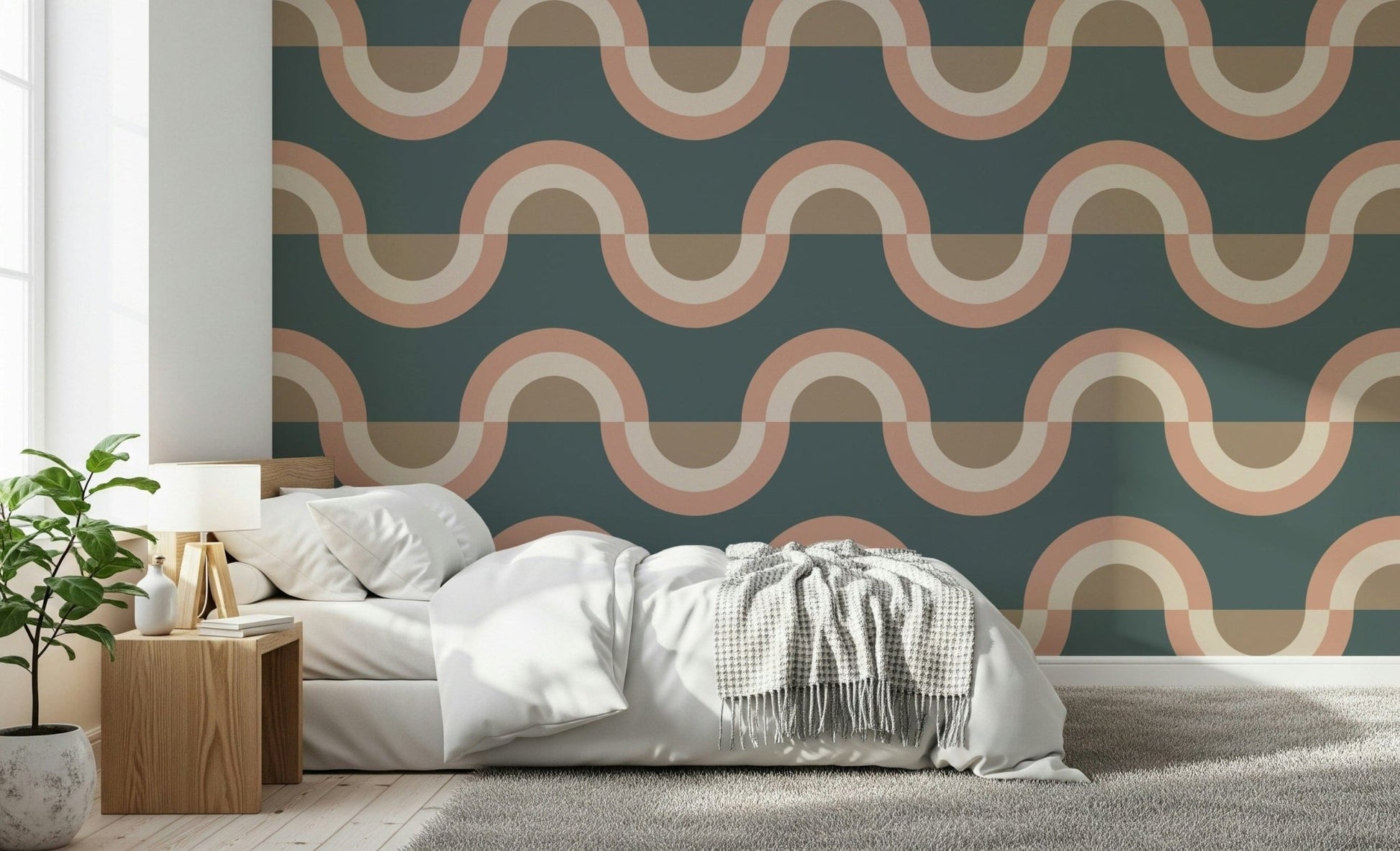 Modern Retro Arcs Decor wallpaper mural with teal and peach retro waves behind a white bed and wood nightstand in a bedroom