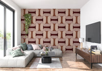 Modern Textured Tiles Clay wallpaper in terracotta behind a grey sectional sofa and wood TV console in a living room