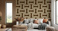 Modern Textured Tiles Umber wallpaper in brown and cream behind a grey sofa and rattan table by a wood slat wall